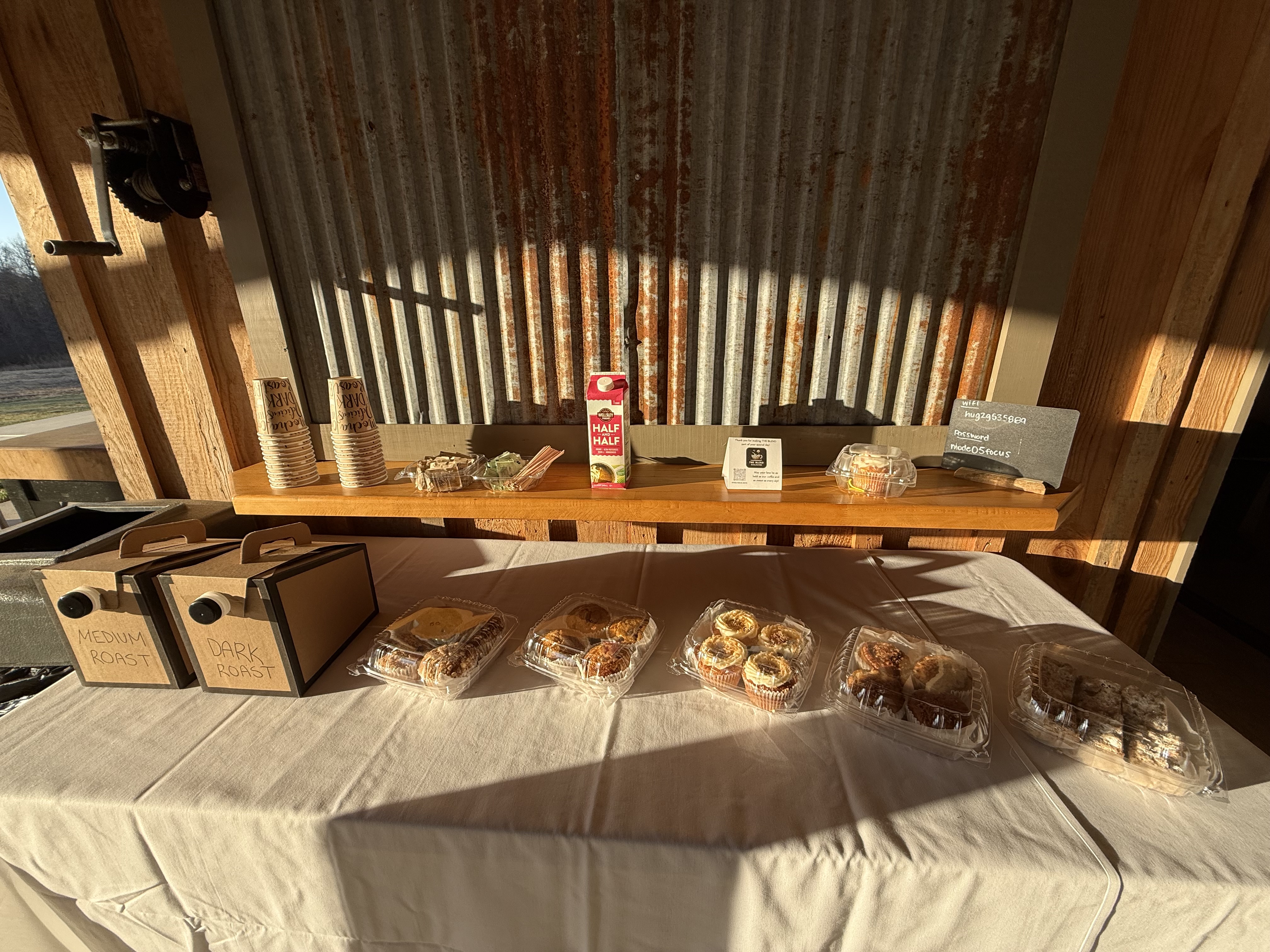 The Blend Burlington catering setup with pastries and coffee